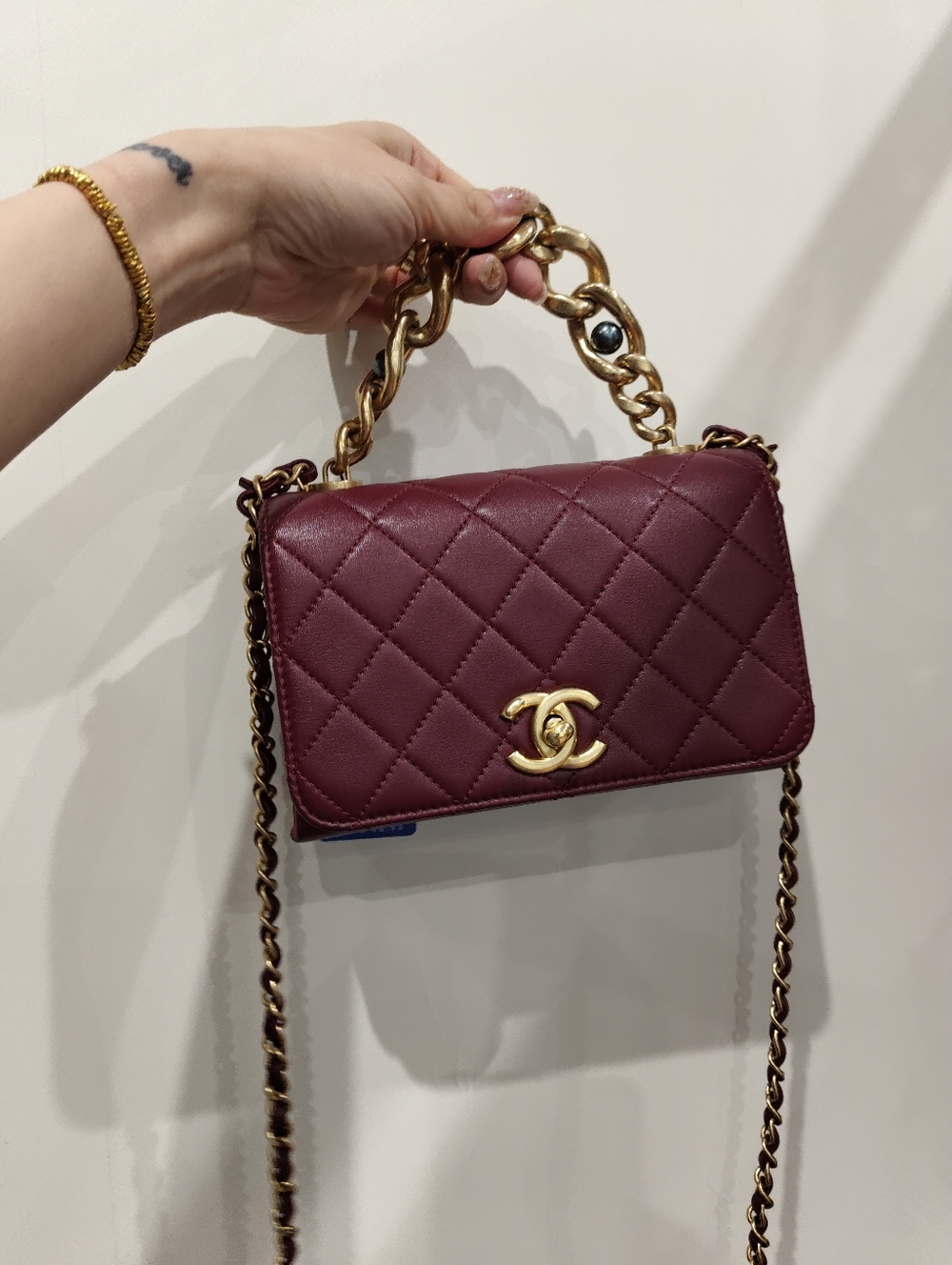 CHANEL Quilted Burgundy Lambskin Crossbody with Gold Chain
